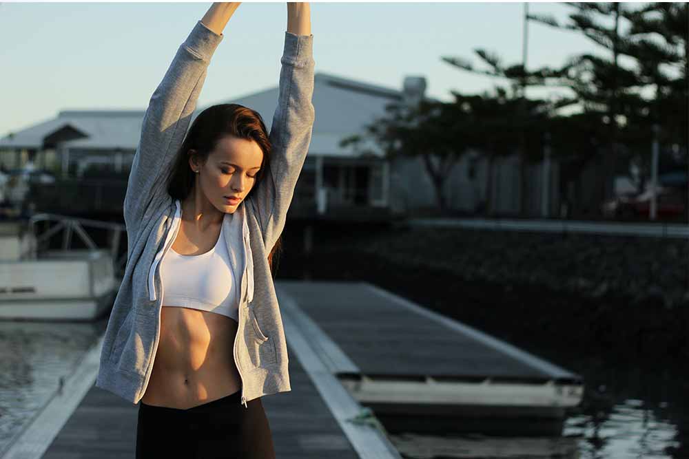 fitness woman stretching close up